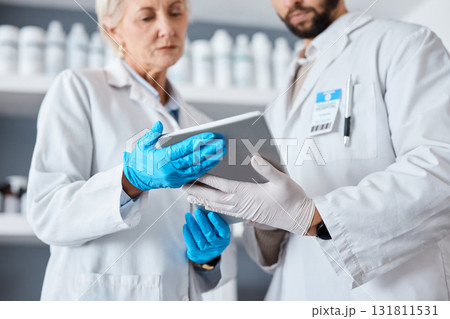 Science, research and team with tablet in laboratory for tests results, medical report and study. Health, biotechnology and scientists with digital tech for data analysis, investigation and analytics Science, research and team with tablet in laboratory for tests results, medical report and study. Health, biotechnology and scientists with digital tech for data analysis, investigation and analytics 131811531