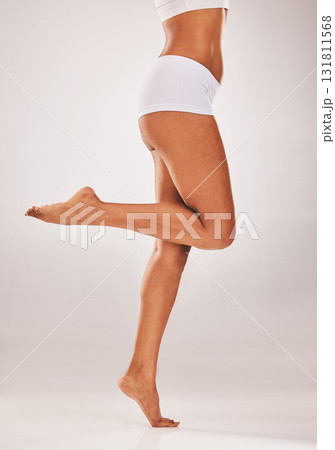Legs, beauty and woman isolated on a white background for cosmetics, skincare and underwear in studio mockup. Dermatology, aesthetic and model body for epilation or hair removal results with mock up 131811568
