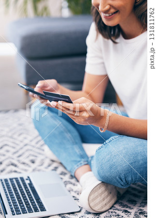 Credit card, online shopping and woman with fintech, banking and easy payment on home carpet. Young person or student with phone and laptop for e commerce sale, finance and wealth in her living room Credit card, online shopping and woman with fintech, banking and easy payment on home carpet. Young person or student with phone and laptop for e commerce sale, finance and wealth in her living room 131811762