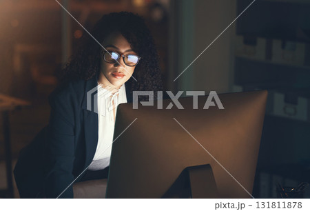 Business, office and black woman on computer at desk for project, strategy report and reading email. Corporate manager, overtime and female standing done working on schedule, planning and research 131811878