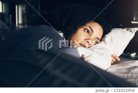 Anxiety, depression and woman in bed with insomnia, thinking and trying to sleep while sick. Morning, sunrise and sad and depressed girl with stress, mental health problem and fatigue in bedroom 131812058