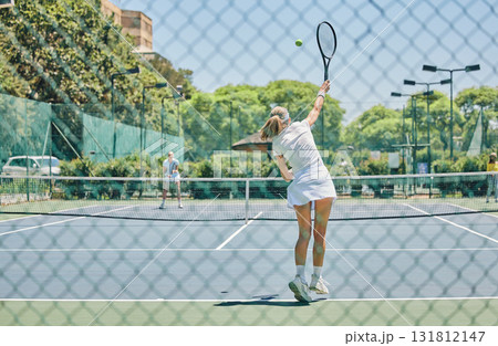 Tennis, sports and woman on outdoor court, fitness motivation and competition with athlete training for game. Workout, healthy and player on court, active with sport and exercise with action on turf 131812147