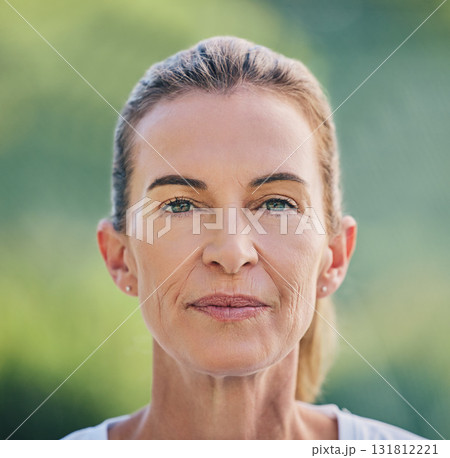 Beauty, portrait and mature woman in nature for health, wellness or fresh air in summer. Beautiful, headshot and senior female model from Australia standing in a green garden, park or field. Beauty, portrait and mature woman in nature for health, wellness or fresh air in summer. Beautiful, headshot and senior female model from Australia standing in a green garden, park or field. 131812221