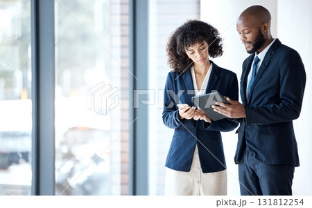 Business people, tablet and checking data in digital marketing, corporate data or networking at the office. Employee man and woman with touchscreen in planning for company idea or market strategy 131812254