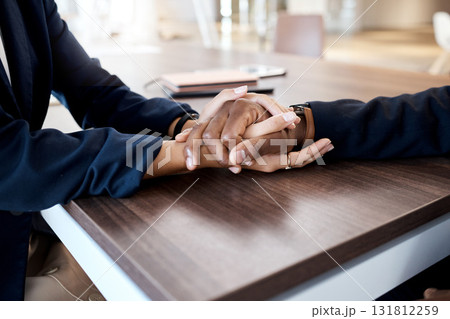 Love, comfort and hands of couple in support of bad news, cancer or diagnosis at a table, unity and trust. Hand, holding empathy by woman with man for depression, prayer and kindness during crisis 131812259