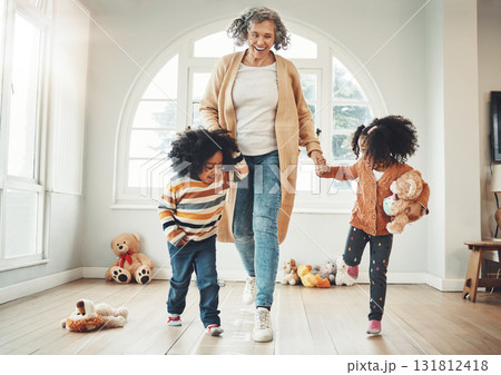 Happy family, grandmother and children play hopscotch in home having fun, enjoy games and relax in bedroom. Bonding, entertainment and grandma with kids for jumping, playing and numbers activity Happy family, grandmother and children play hopscotch in home having fun, enjoy games and relax in bedroom. Bonding, entertainment and grandma with kids for jumping, playing and numbers activity 131812418