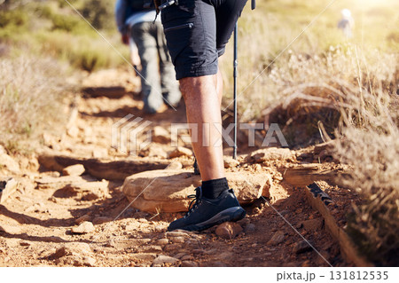 Closeup, legs and hiker in nature, fitness and exercise for wellness, fresh air and on summer vacation. Zoom, leg and athlete outdoor, hiking and workout in the wilderness for health and adventure 131812535