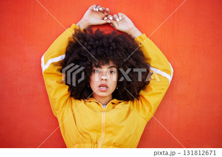 Portrait, fierce and black woman with attitude, power and empowerment with afro on studio background. Face, African American female creative and lady with confidence, casual outfit and motivation 131812671