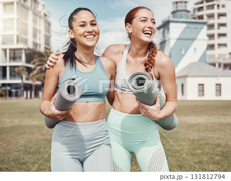 Yoga, fitness and laugh with woman friends in the park together for mental health exercise. Pilates, humor and training with a female yogi and friend outside on a grass field for a summer workout 131812794