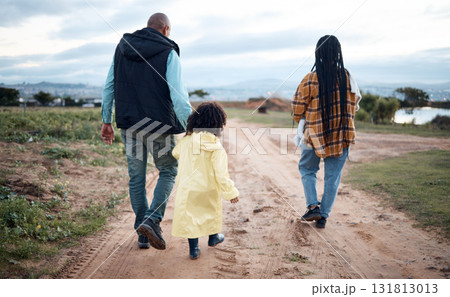 Agriculture, farm and walking family with girl for quality time, adventure and bonding in countryside. Sustainability, farming and back of mom, dad and child ready for harvest, growth and gardening 131813013