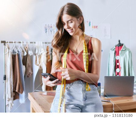 Fashion, designer and creative with woman and phone for manufacturing, management and retail. Planning, fabric and textile with girl in workshop studio for clothes, tailor and small business outlet Fashion, designer and creative with woman and phone for manufacturing, management and retail. Planning, fabric and textile with girl in workshop studio for clothes, tailor and small business outlet 131813180