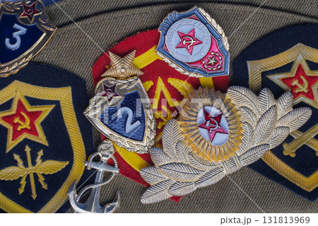 Russian Soviet military cap with military medals and patches. Green cap with several medals honoring top service and three patches all with ruby stars and hammer and sickle emblems. Hero of Country Russian Soviet military cap with military medals and patches. Green cap with several medals honoring top service and three patches all with ruby stars and hammer and sickle emblems. Hero of Country 131813969