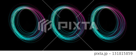 Three swirling circles of colorful light created using freeze light, capturing movement and energy in a dark setting Three swirling circles of colorful light created using freeze light, capturing movement and energy in a dark setting 131815859