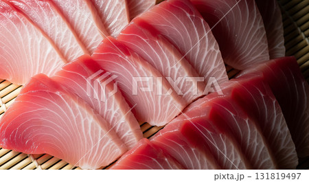 Assorted Tuna Sashimi Cuts on Bamboo Mat Assorted Tuna Sashimi Cuts on Bamboo Mat 131819497