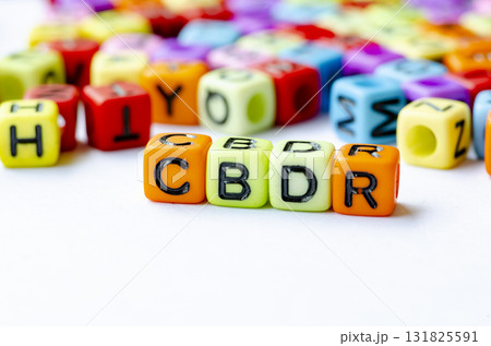 CBDR text on multicolored cubes representing Common But Differentiated Responsibilities. Conservation concept. CBDR text on multicolored cubes representing Common But Differentiated Responsibilities. Conservation concept. 131825591