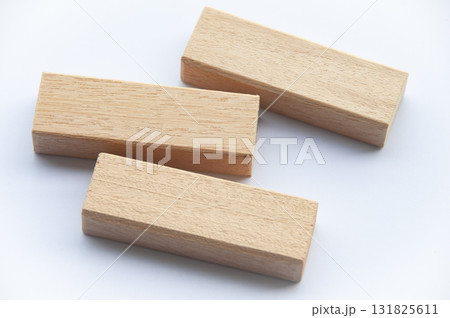 Wooden blocks on white background with customizable space for text. Wooden blocks on white background with customizable space for text. 131825611