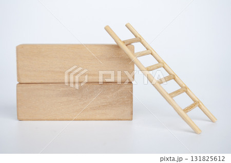 Wooden blocks with wooden ladder with customizable space for text. Wooden blocks with wooden ladder with customizable space for text. 131825612