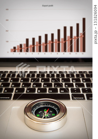  Graphs and compasses showing business performance 131826094