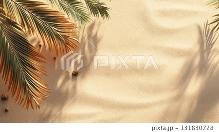 Top view of sandy beach with palm tree leaf shadows, tropical summer vibe. 131830728
