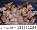 Sizzling Korean BBQ Pork Belly (Samgyeopsal) on a Hot Griddle 131831284
