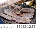 Sizzling Korean BBQ Pork Belly (Samgyeopsal) on a Hot Griddle 131831285