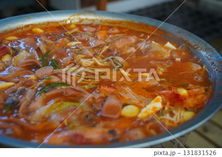 Korean Army Stew (Budae Jjigae) Boiling in a Large Pot 131831526