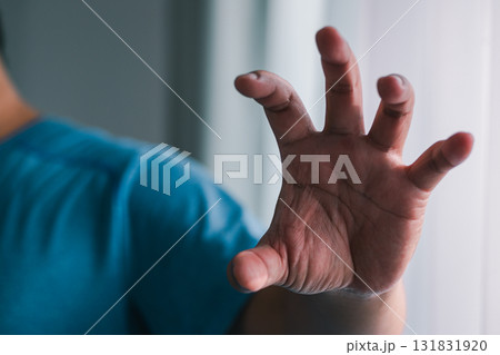 Dynamic hand gesture indoor setting human interaction close-up view expressive concept 131831920