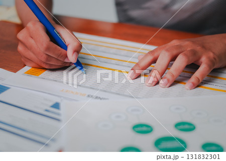 Business analysis event office space document review professional environment close-up view workflow optimization 131832301