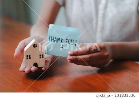 Gratitude business celebrating success with a thank you note office image professional close-up appreciation 131832336