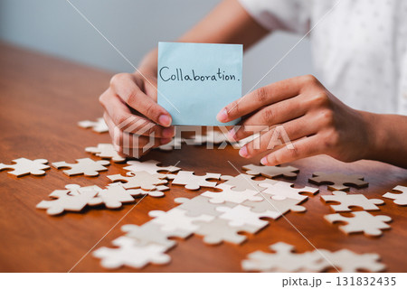 Collaboration workshop office space team building activity indoor setting close-up view engaging concept Collaboration workshop office space team building activity indoor setting close-up view engaging concept 131832435