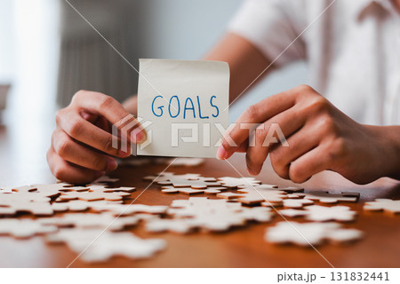 Setting personal goals home office inspirational image indoor environment close-up view motivation concept Setting personal goals home office inspirational image indoor environment close-up view motivation concept 131832441