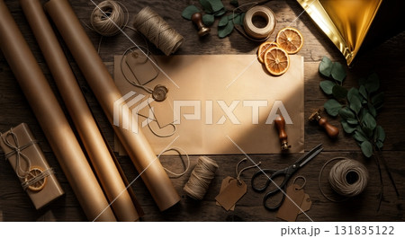 Artisan Christmas Gift Wrapping Workshop Station with Kraft Paper Rolls Natural Twine Vintage Scissors and Eucalyptus Sprigs on Reclaimed Barn Wood Surface Artisan Christmas Gift Wrapping Workshop Station with Kraft Paper Rolls Natural Twine Vintage Scissors and Eucalyptus Sprigs on Reclaimed Barn Wood Surface 131835122