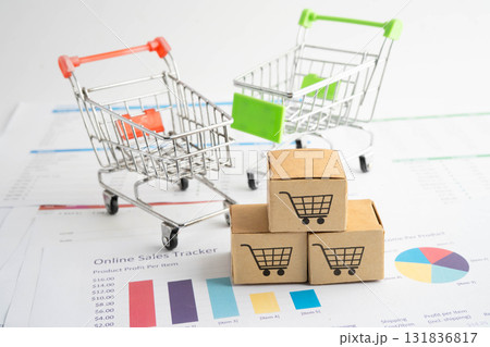 Online shopping, Shopping cart box on business graph, import export, finance commerce. 131836817