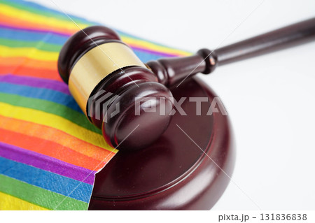 Gavel for judge lawyer on rainbow flag, symbol of LGBT pride month. 131836838
