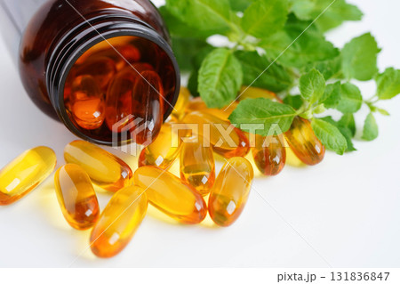 Alternative medicine herbal organic capsule with vitamin E omega 3 fish oil, mineral, drug with herbs leaf natural supplements for healthy good life. 131836847