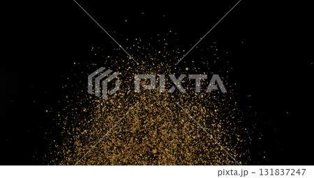 Powerful burst of clay particles exploding upward in a dense cloud, isolated on black. High-speed photography capturing the dynamic texture of dry earth in motion. Powerful burst of clay particles exploding upward in a dense cloud, isolated on black. High-speed photography capturing the dynamic texture of dry earth in motion. 131837247