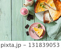 Delicious lemon cheesecake with tea set for dessert presentation. Top view flat lay background. Copy space. 131839053