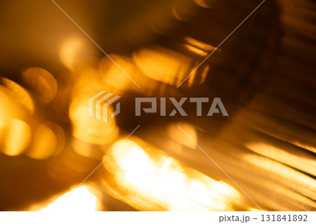 オレンジカラー系メタリックイメージのキラキラ背景素材 131841892