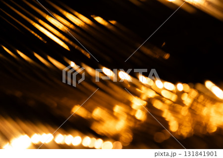 オレンジカラー系メタリックイメージのキラキラ背景素材 131841901