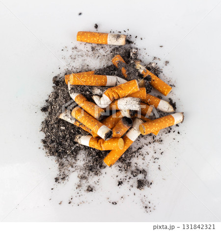Pile of Cigarette Butts on White Background Pile of Cigarette Butts on White Background 131842321