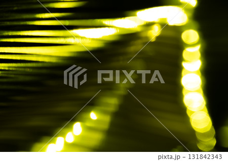 イエローグリーンカラー系メタリックイメージのキラキラ背景素材 131842343