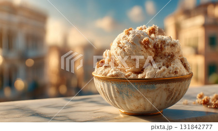 Delightful Dessert. A bowl of creamy ice cream with crumbly toppings 131842777