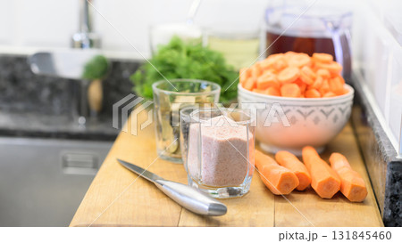 Homemade Pickled Carrot Preparation on Cutting Board Homemade Pickled Carrot Preparation on Cutting Board 131845460