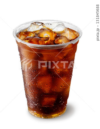 Iced cola in misted disposable plastic cup isolated on white background Iced cola in misted disposable plastic cup isolated on white background 131845688