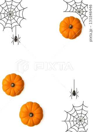 Halloween frame with mini orange pumpkins and black spider webs on white background Halloween frame with mini orange pumpkins and black spider webs on white background 131846446