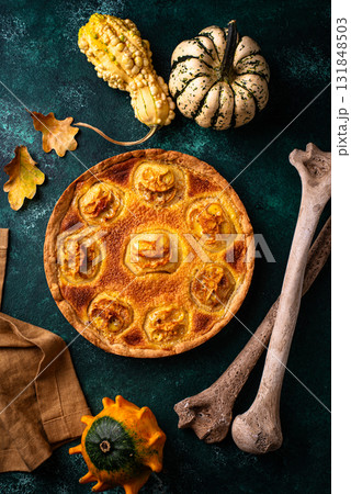 Halloween apple pie with scary faces 131848503