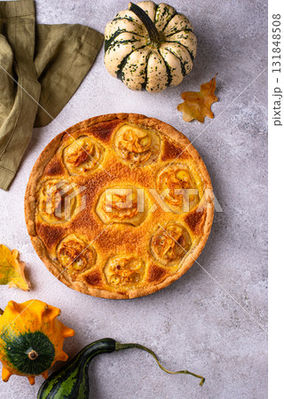 Halloween apple pie with scary faces Halloween apple pie with scary faces 131848508