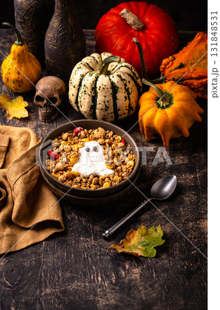 Halloween breakfast. Granola and ghost from yogurt 131848531