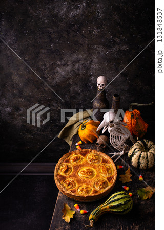 Halloween apple pie with scary faces Halloween apple pie with scary faces 131848537