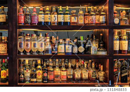 An assortment of high-class liquor in a luxury hotel bar. An assortment of high-class liquor in a luxury hotel bar. 131848833